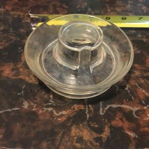 Glass chicken waterer base has a patent number 126997